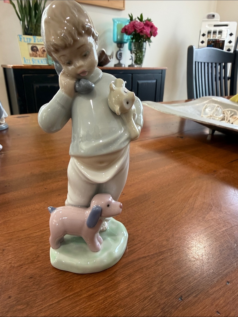 Nao by Lladro “boy on phone with dog and teddy bear”